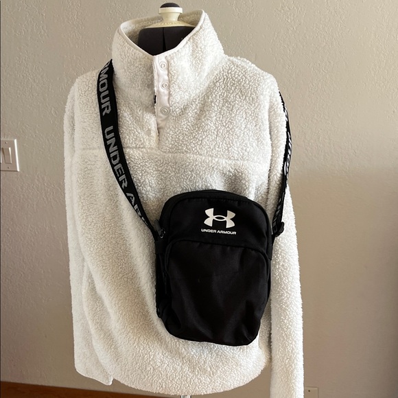 Under Armour Handbags - Under Armour Black Mini Crossbody Pouch with Logo Strap